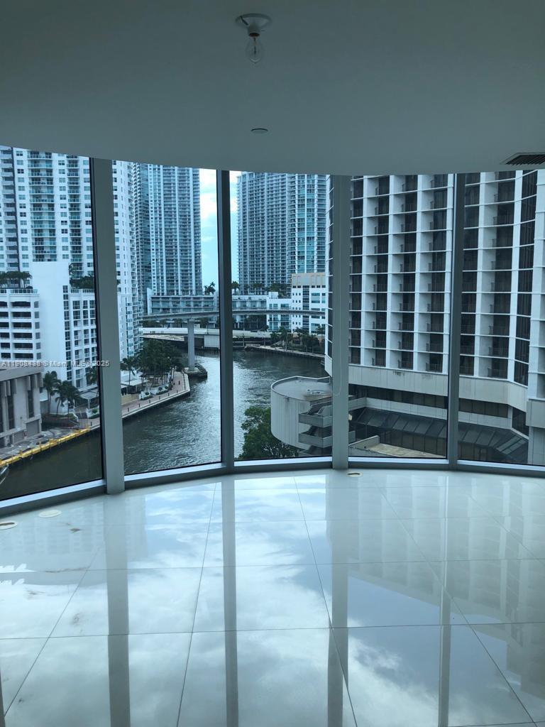 200 Biscayne Blvd Way, Unit 902 Miami, FL 33131 - Photo 23 of 23 a view of a living room and balcony