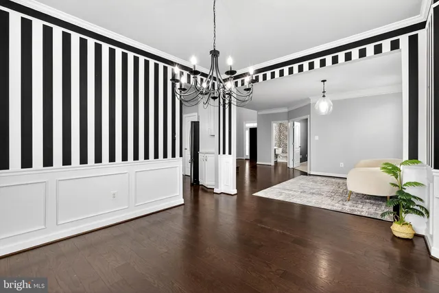 a kitchen with sink refrigerator and microwave