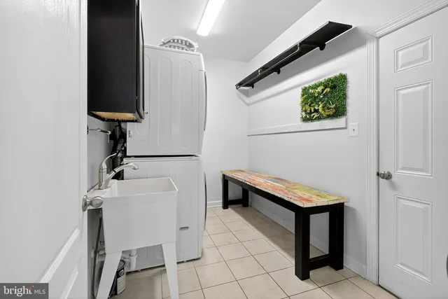 a bathroom with a sink a vanity and a mirror
