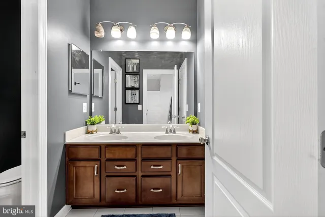 a view of house with backyard