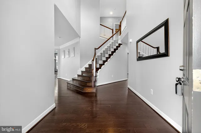 a view of entryway with wooden floor