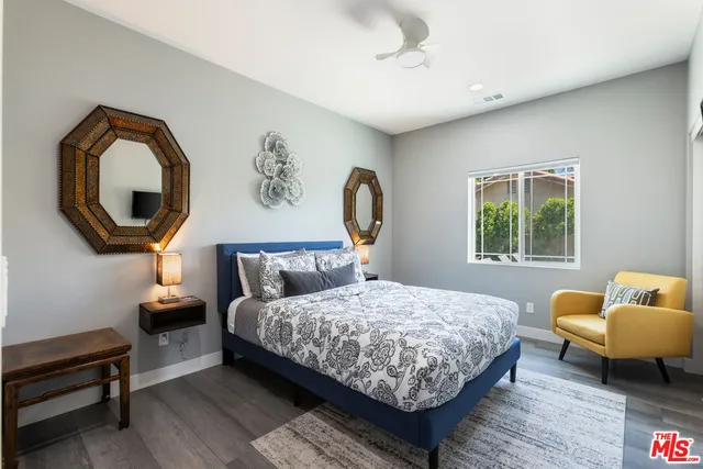 a bathroom with a sink a toilet and a shower