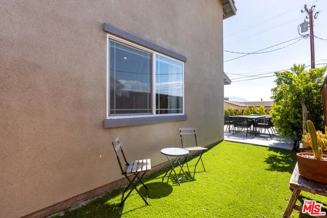 a view of a terrace with sitting area