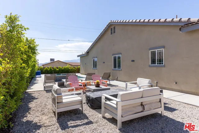 a view of a yard with seating area