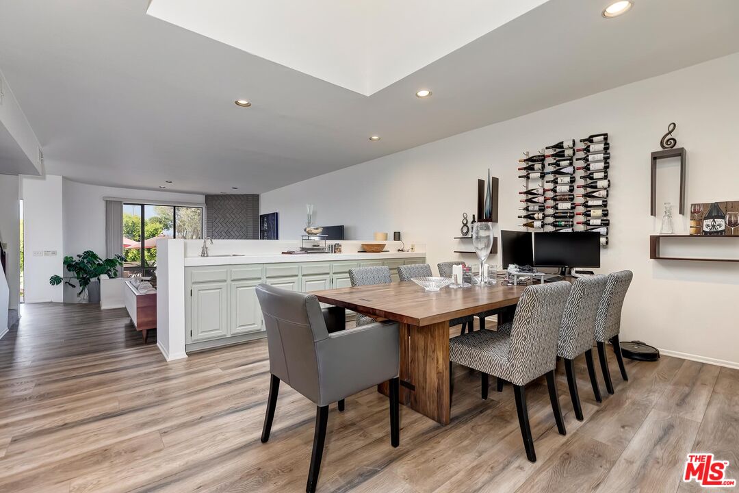 132 Convoy Street Playa del Rey, CA 90293 - Photo 5 of 16 a view of a dining room with furniture and wooden floor