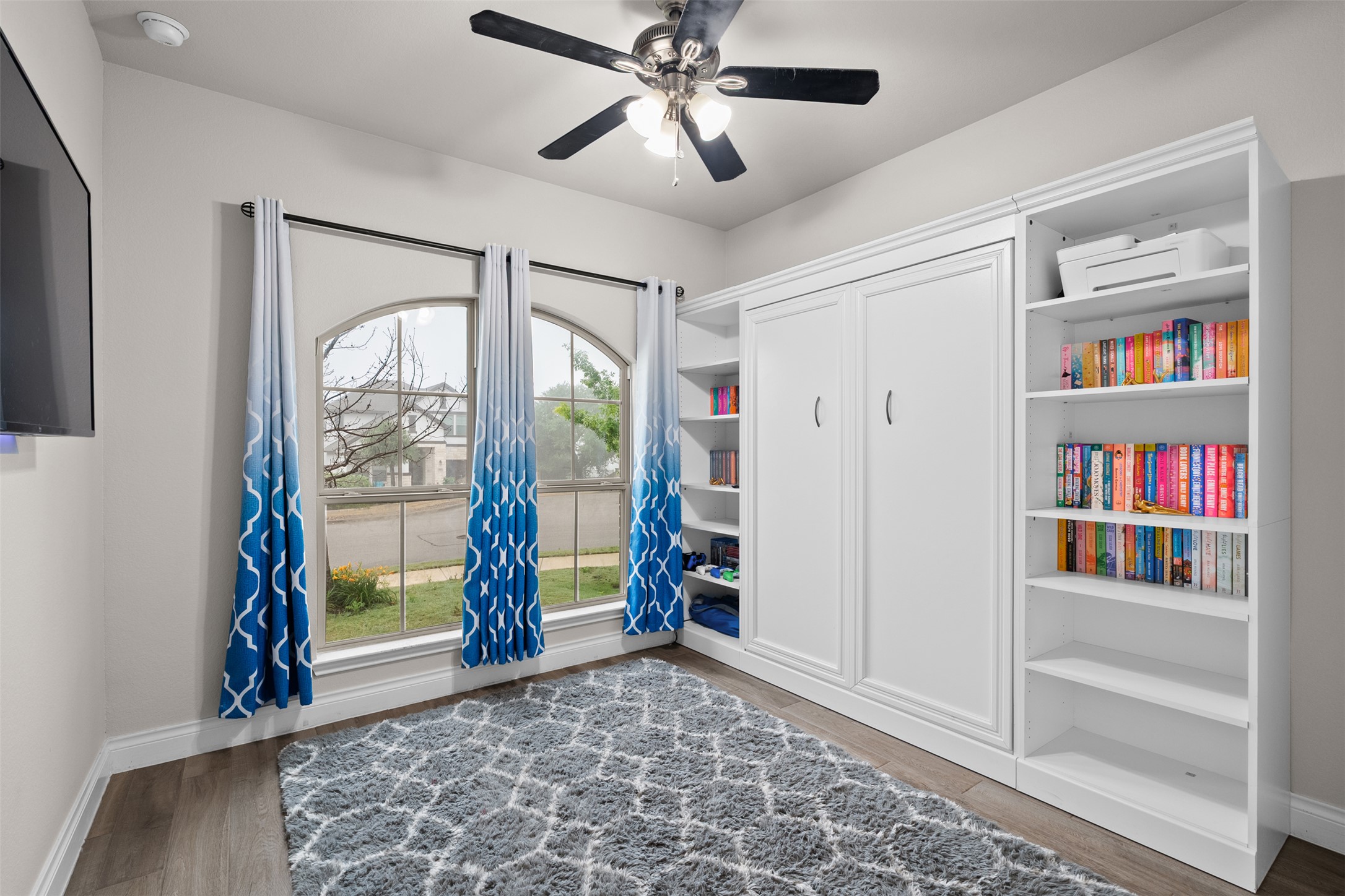 341 Pisa Lane Georgetown, TX 78628 - Photo 6 of 31 a view of a livingroom with a bookshelf