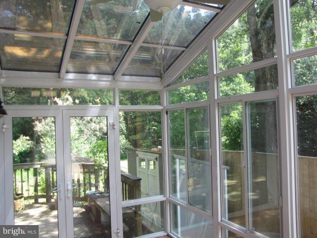 10503 Malone Street Silver Spring, MD 20902 - Photo 7 of 11 Enclosed Glass Porch with heating and air!