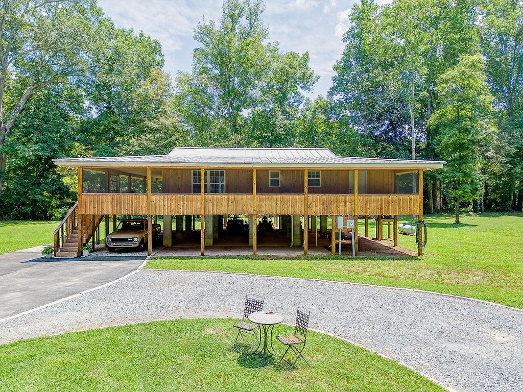 2812 Roland Hayes Parkway Southwest Calhoun, GA 30701 - Photo 1 of 1 a view of a house with a yard