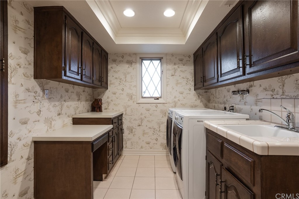 19051 Mesa Drive Villa Park, CA 92861 - Photo 22 of 28 a kitchen with a sink stove and cabinets