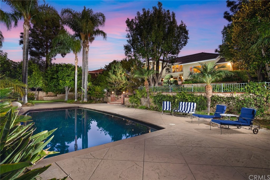 19051 Mesa Drive Villa Park, CA 92861 - Photo 5 of 28 a view of a swimming pool with a patio and a garden