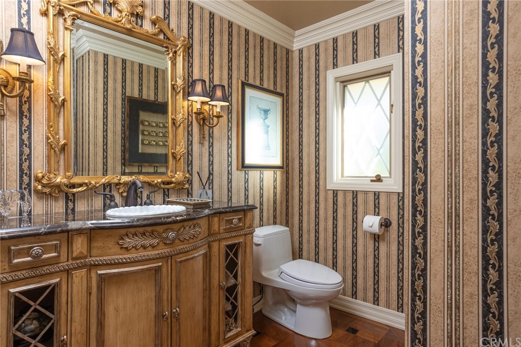 19051 Mesa Drive Villa Park, CA 92861 - Photo 9 of 28 a bathroom with a sink a toilet and a mirror