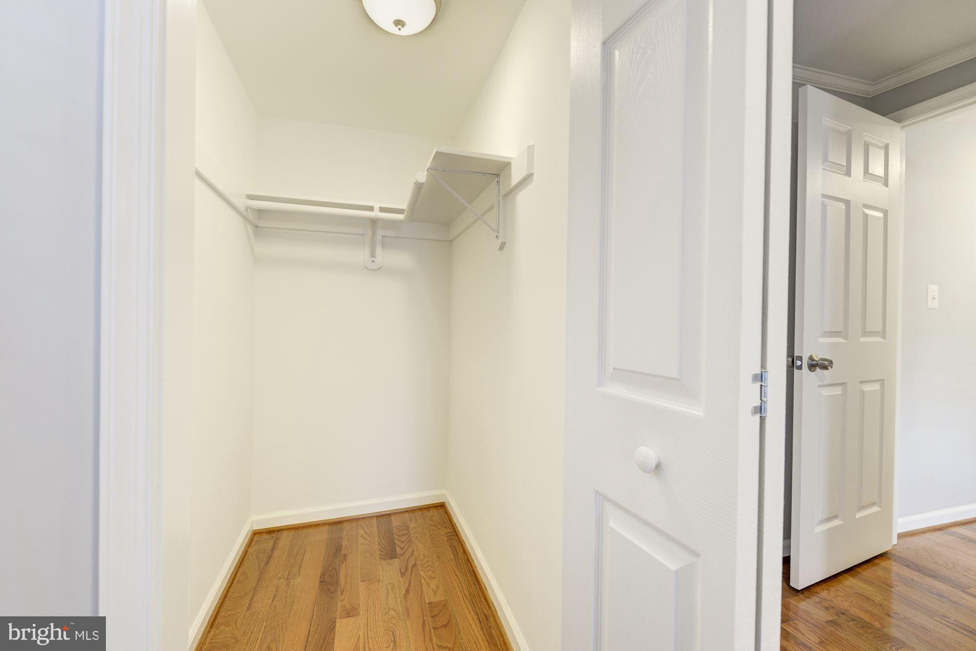 1914 10th Street Northwest Washington, DC 20001 - Photo 14 of 27 a view of a hallway with wooden floor and closet