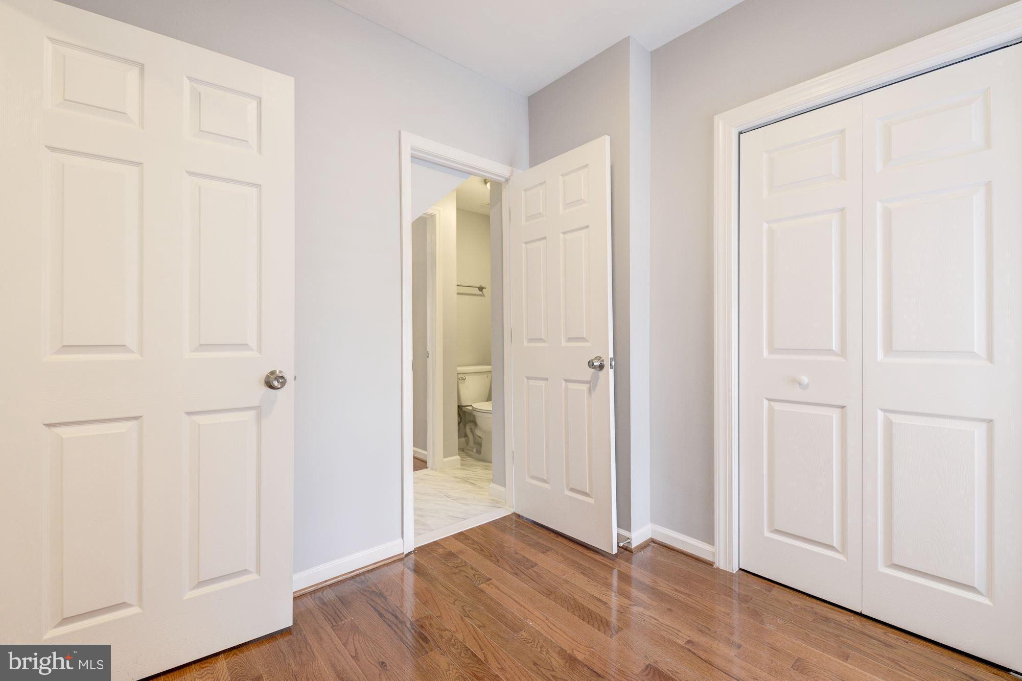 1914 10th Street Northwest Washington, DC 20001 - Photo 15 of 27 an empty room with wooden floor