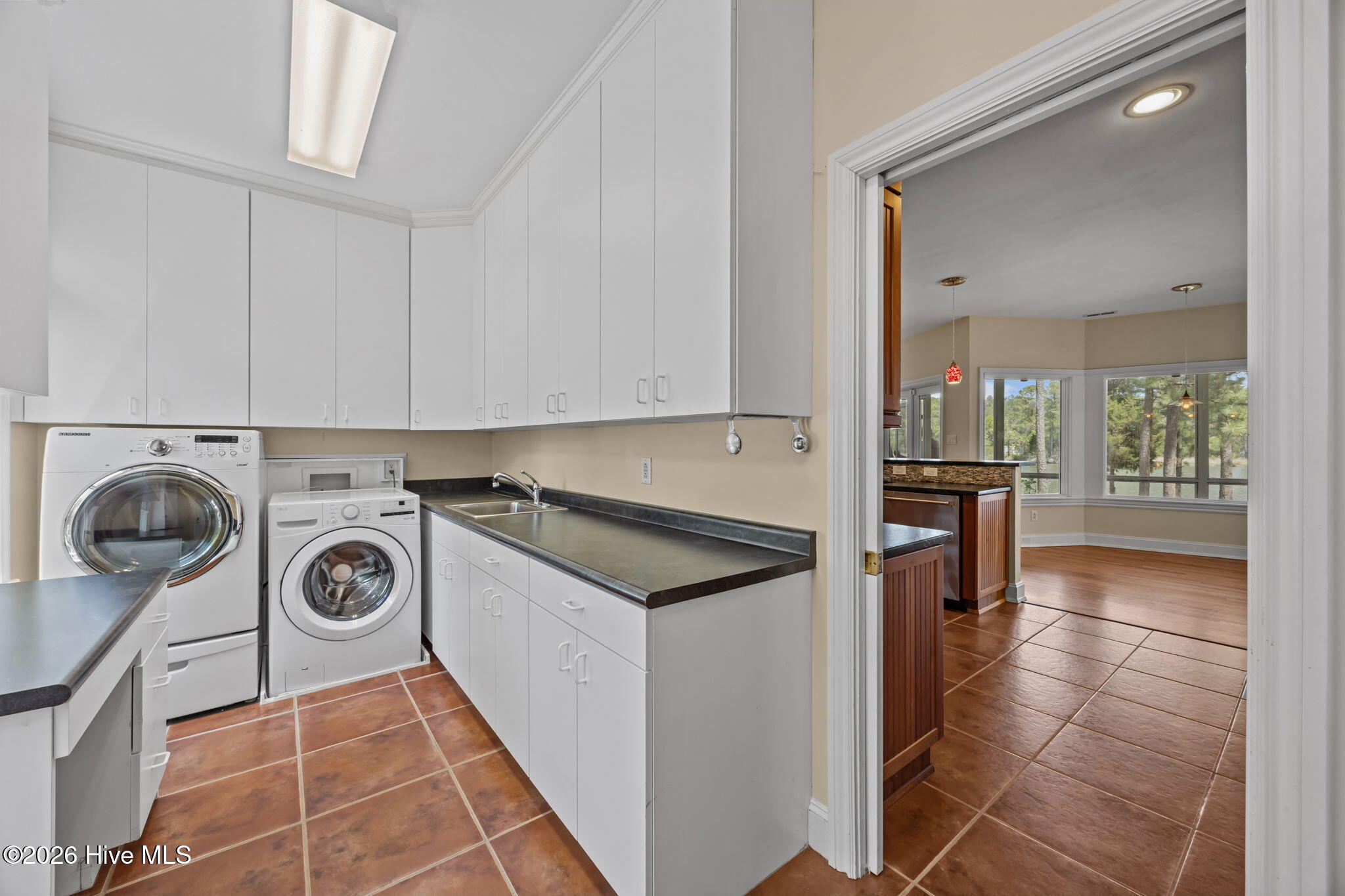 651 Quail Road Merritt, NC 28556 - Photo 34 of 89 Laundry to Kitchen