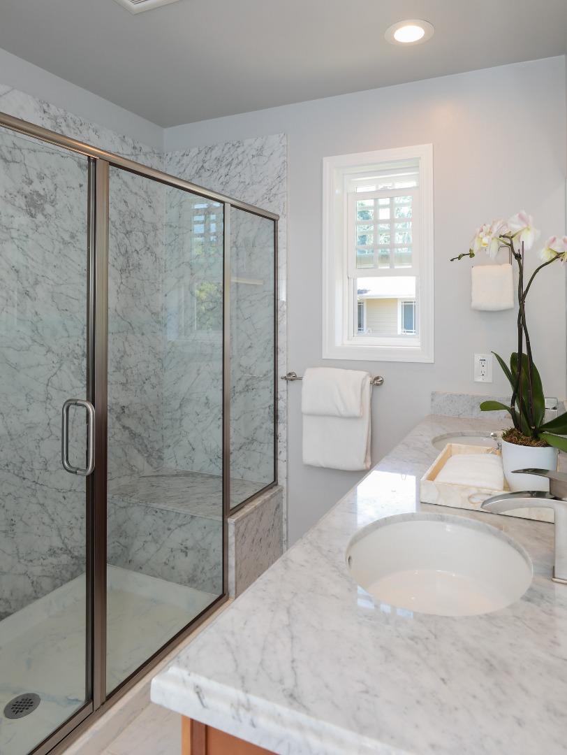 161 Willow Road Menlo Park, CA 94025 - Photo 11 of 14 a bathroom with a tub sink and mirror