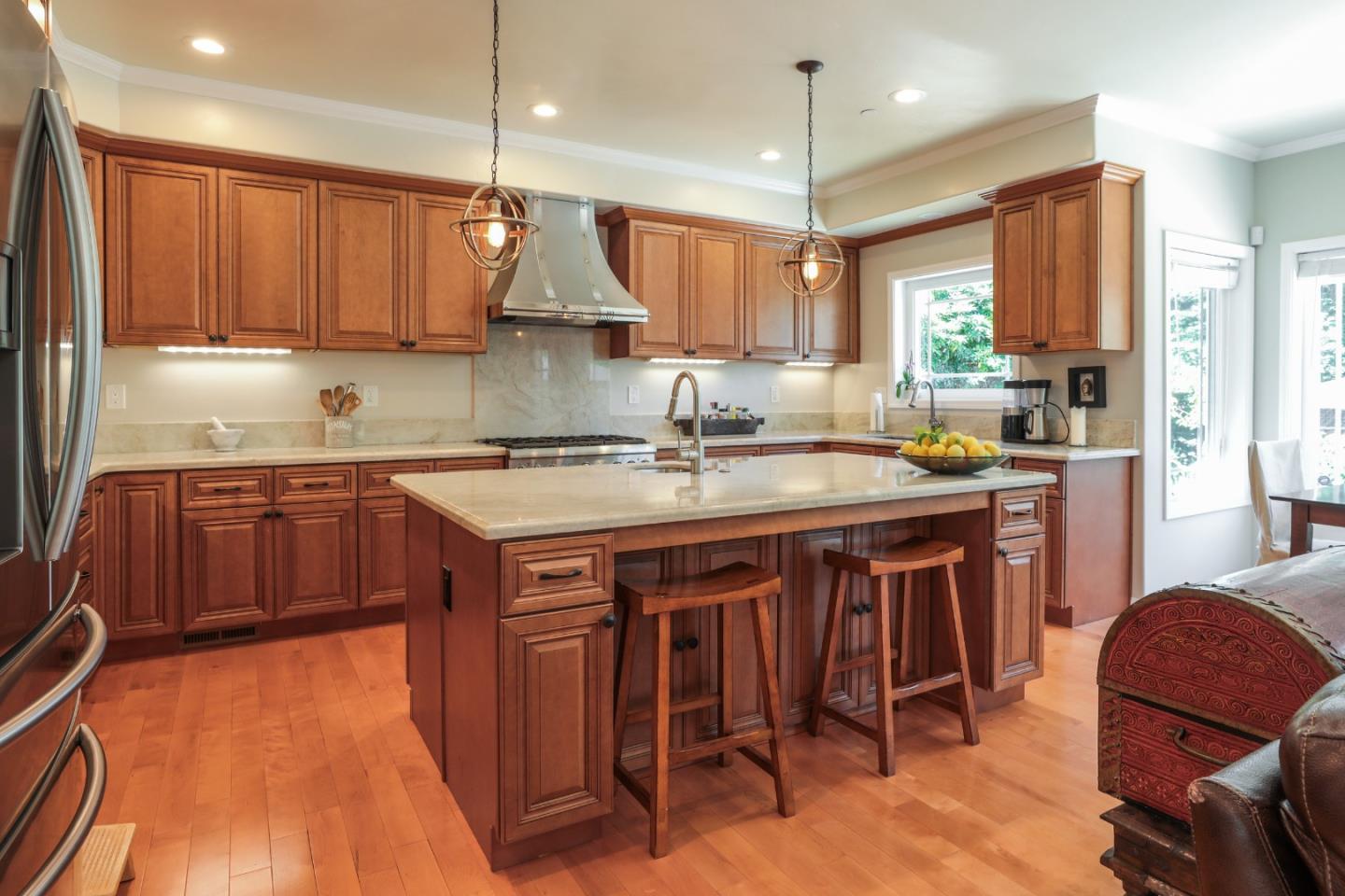 161 Willow Road Menlo Park, CA 94025 - Photo 7 of 14 a kitchen with a sink appliances and cabinets