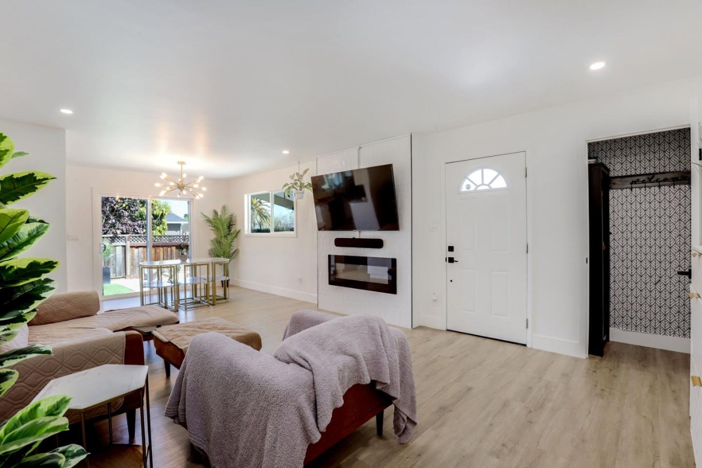 681 Arnold Drive Gilroy, CA 95020 - Photo 14 of 55 a living room with furniture and a flat screen tv