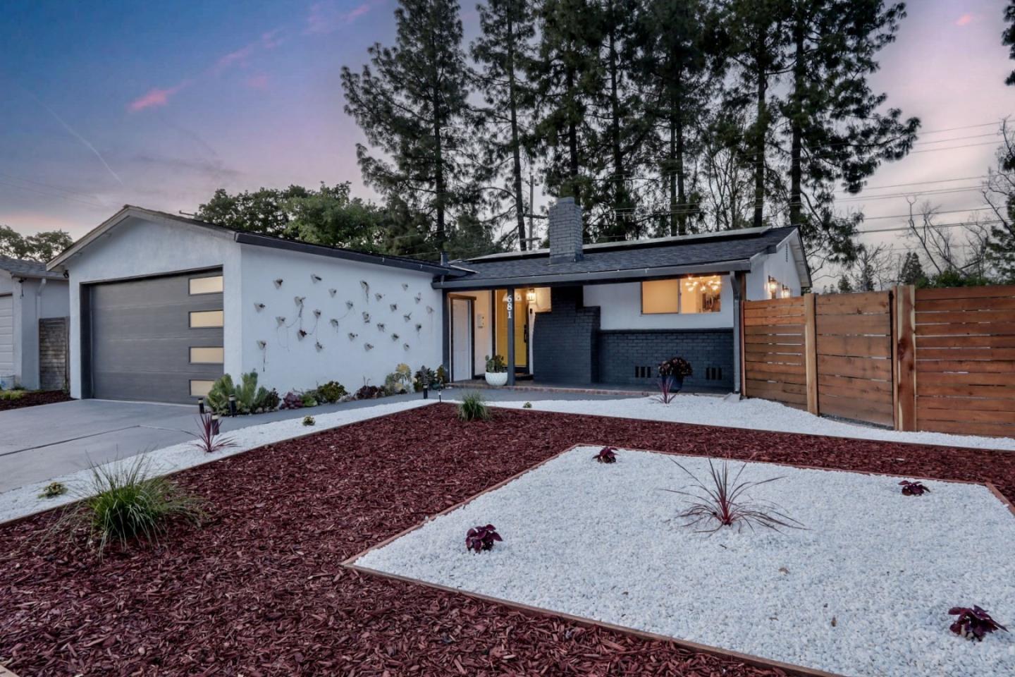 681 Arnold Drive Gilroy, CA 95020 - Photo 2 of 55 a front view of a house with garden