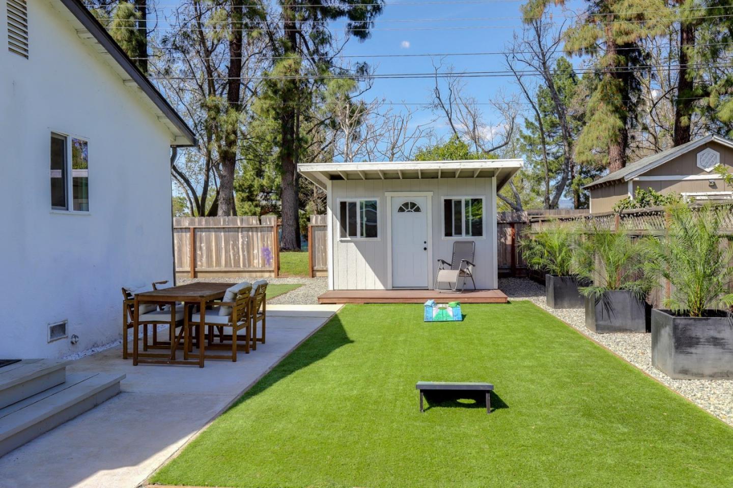 681 Arnold Drive Gilroy, CA 95020 - Photo 38 of 55 a view of a house with swimming pool lawn chairs and a yard