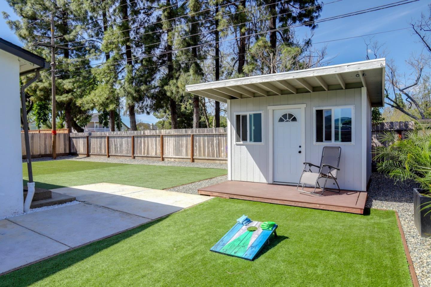 681 Arnold Drive Gilroy, CA 95020 - Photo 40 of 55 a view of a house with a yard patio and fire pit