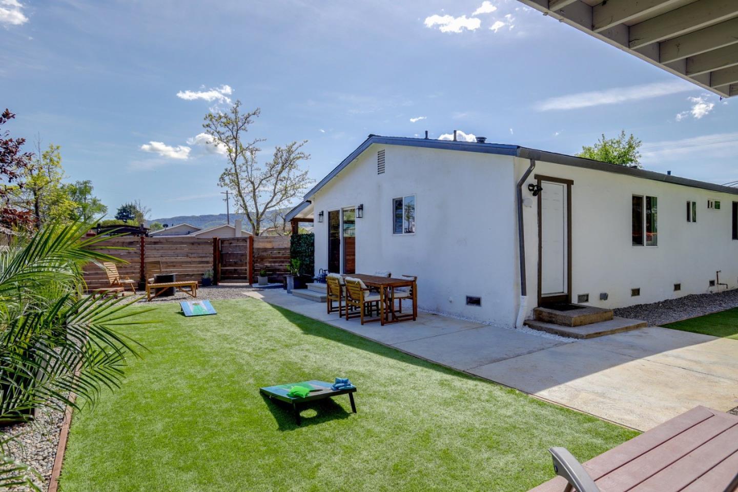 681 Arnold Drive Gilroy, CA 95020 - Photo 41 of 55 a view of a backyard with furniture and a garage