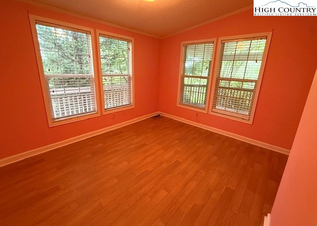 1269 Howell Road Lansing, NC 28643 - Photo 16 of 34 a view of an empty room with a window