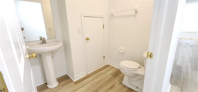 a bathroom with a sink and toilet