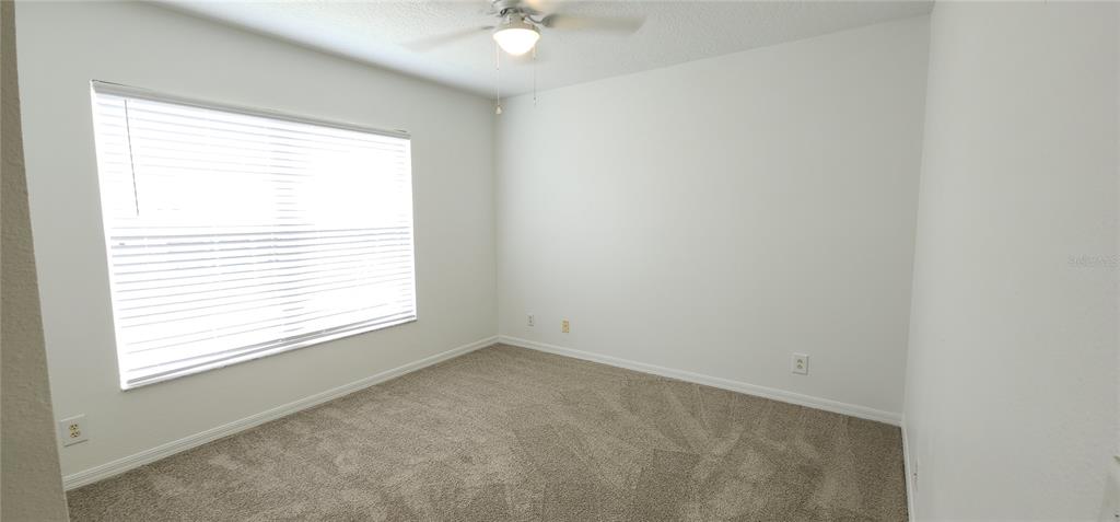 259 Castlekeeper Place Valrico, FL 33594 - Photo 9 of 15 an empty room with a window