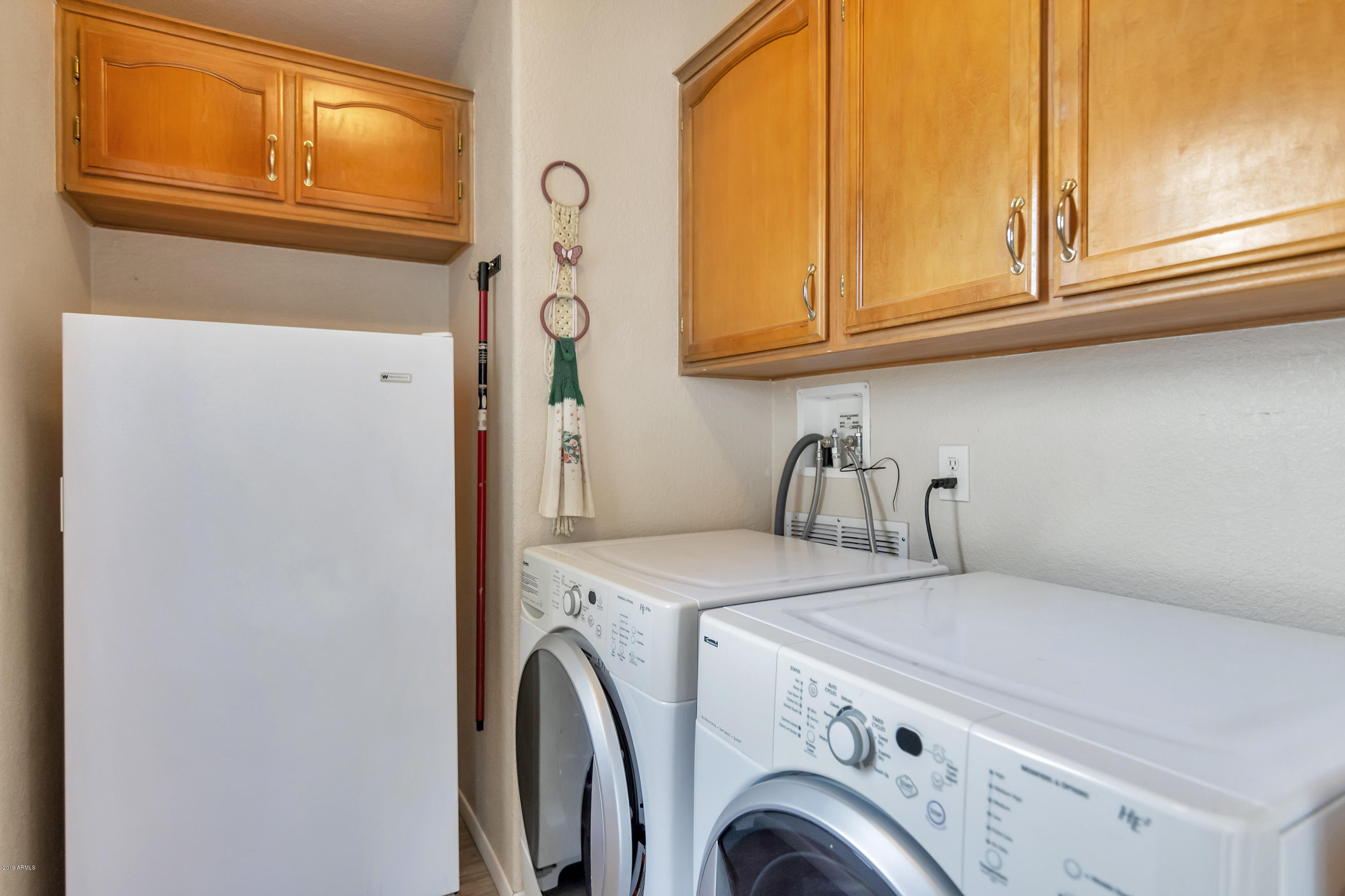 19716 West Rustler Road Buckeye, AZ 85326 - Photo 18 of 33 Laundry room