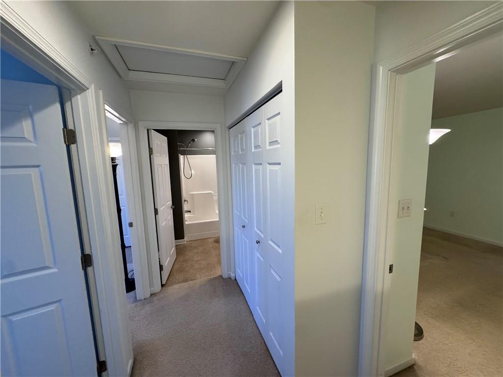 280 Broadstone Drive Mars, PA 16046 - Photo 14 of 22 a view of a hallway with wooden walls and stairs