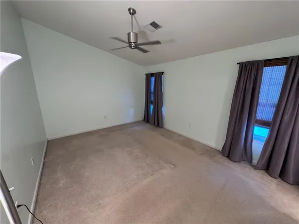 a view of empty room with front door
