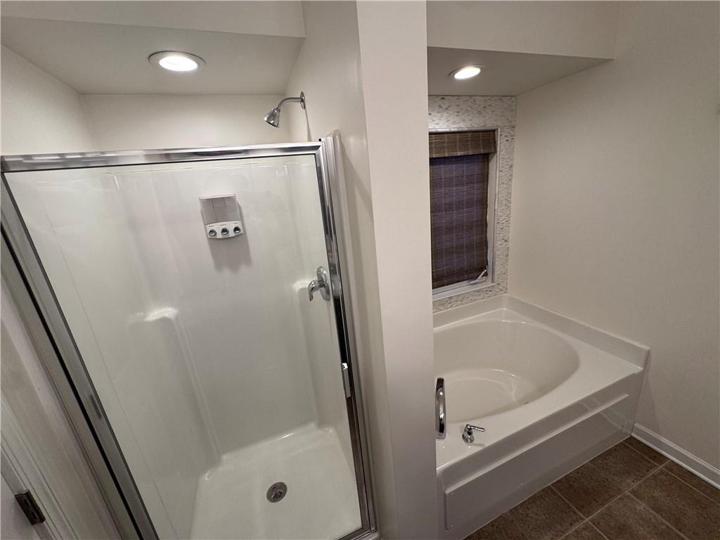 280 Broadstone Drive Mars, PA 16046 - Photo 18 of 22 a bathroom with a glass shower door and a sink