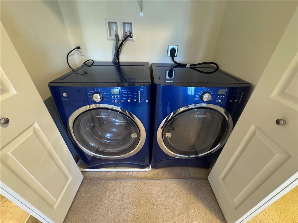 280 Broadstone Drive Mars, PA 16046 - Photo 22 of 22 a view of a bedroom with washer and dryer
