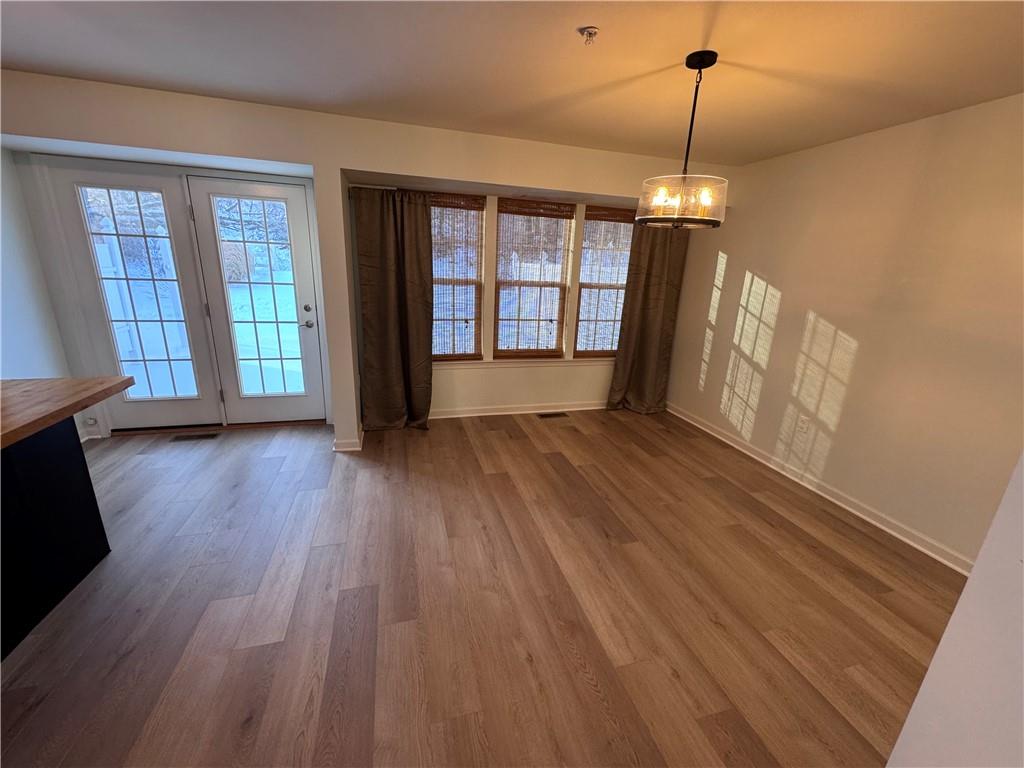 280 Broadstone Drive Mars, PA 16046 - Photo 10 of 22 a view of an empty room with wooden floor and a window