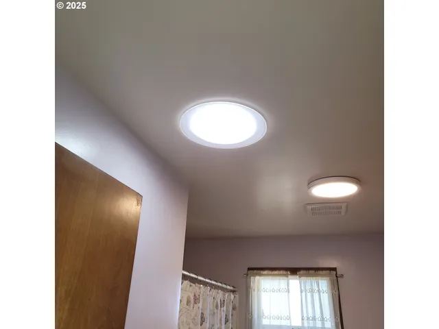 a view of a room with a window