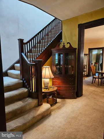 a view of entryway livingroom and hall