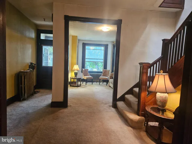 a view of a livingroom with furniture and a livingroom