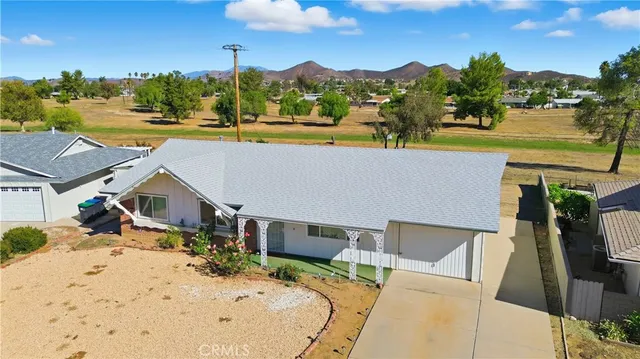 a view of a swimming pool with a patio
