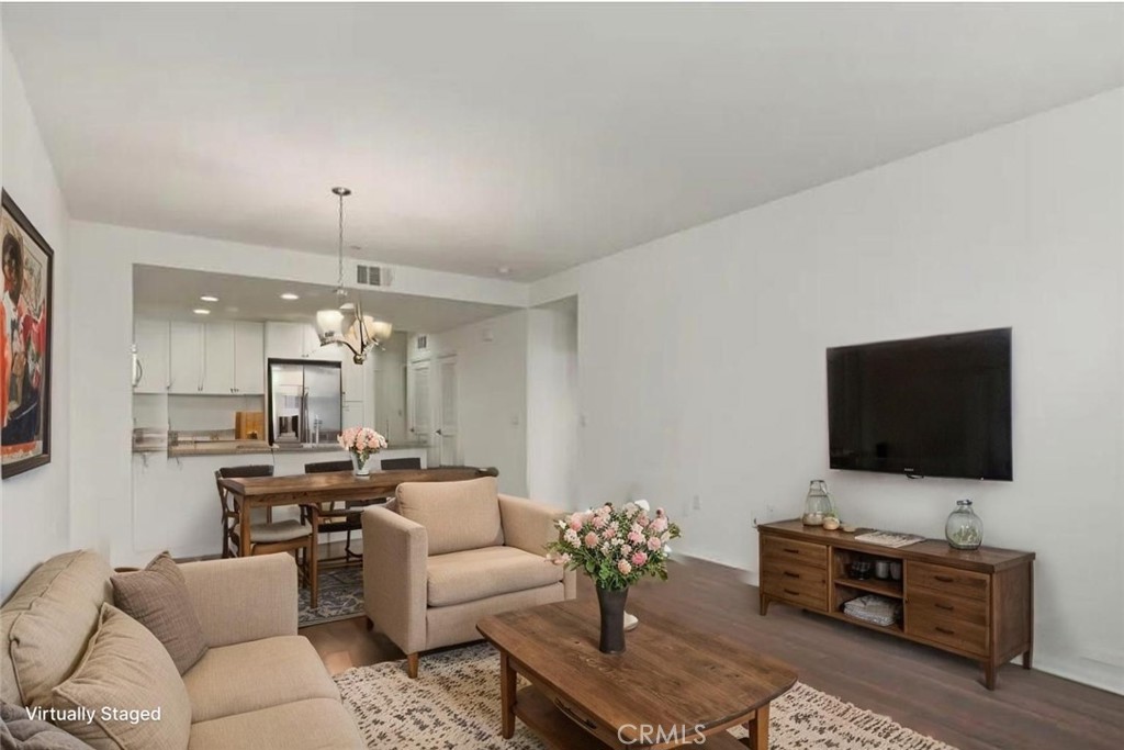 408 West Main Street Alhambra, CA 91801 - Photo 4 of 10 a living room with furniture and a flat screen tv