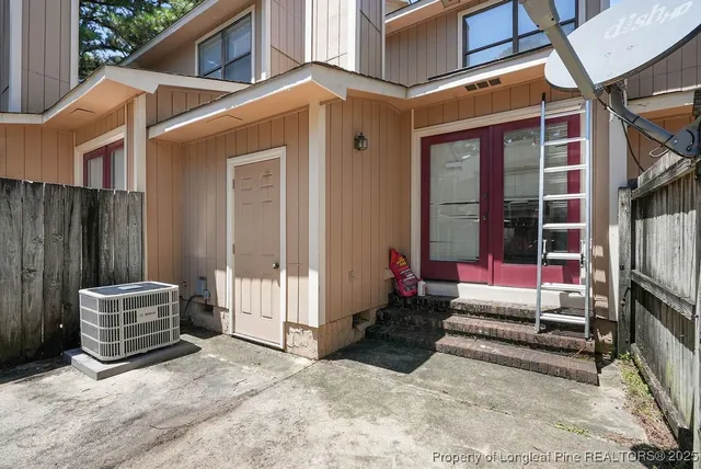a view of backyard with seating space