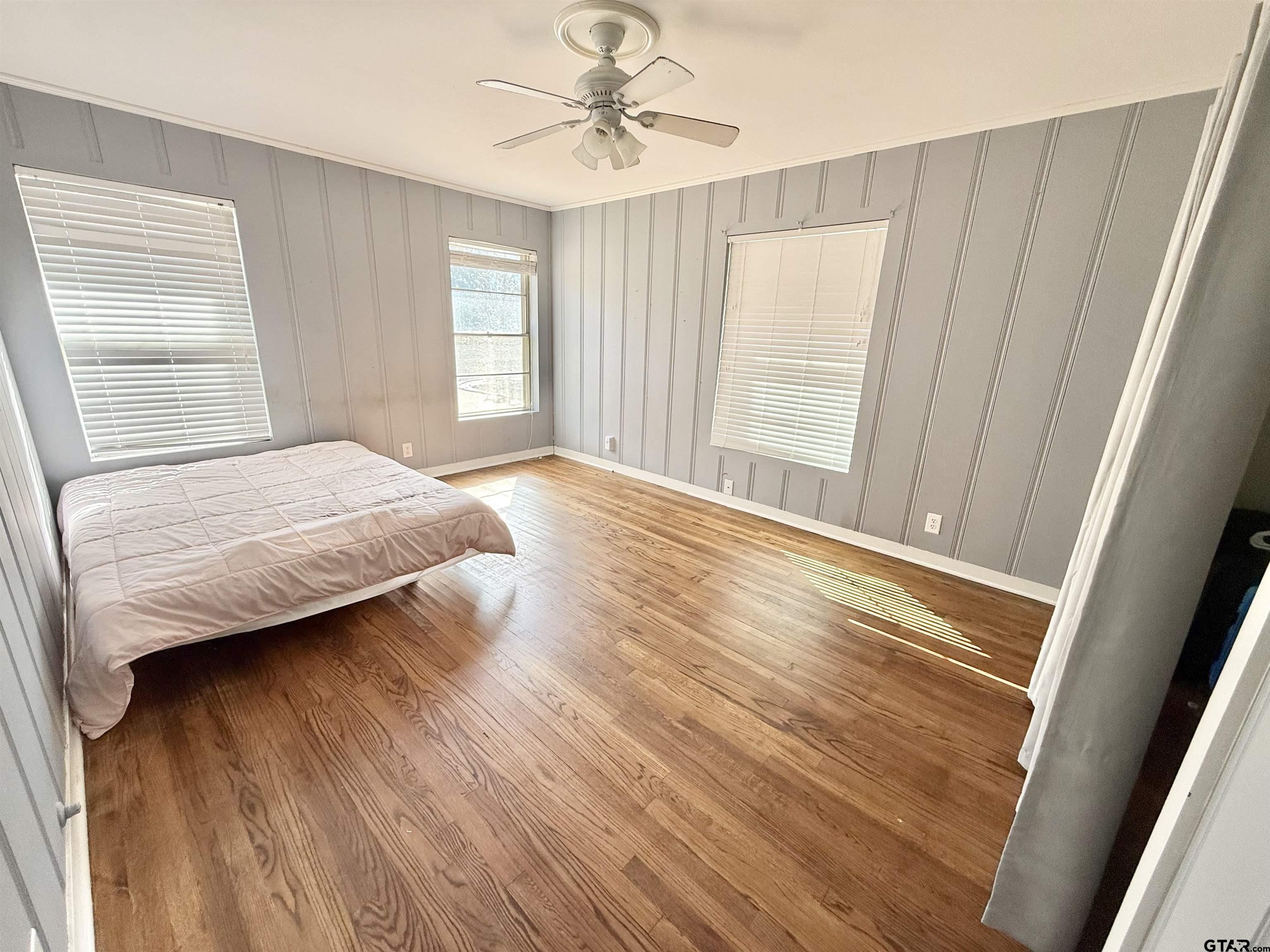 2008 Longview Drive Henderson, TX 75652 - Photo 22 of 27 a bedroom with a bed and a window