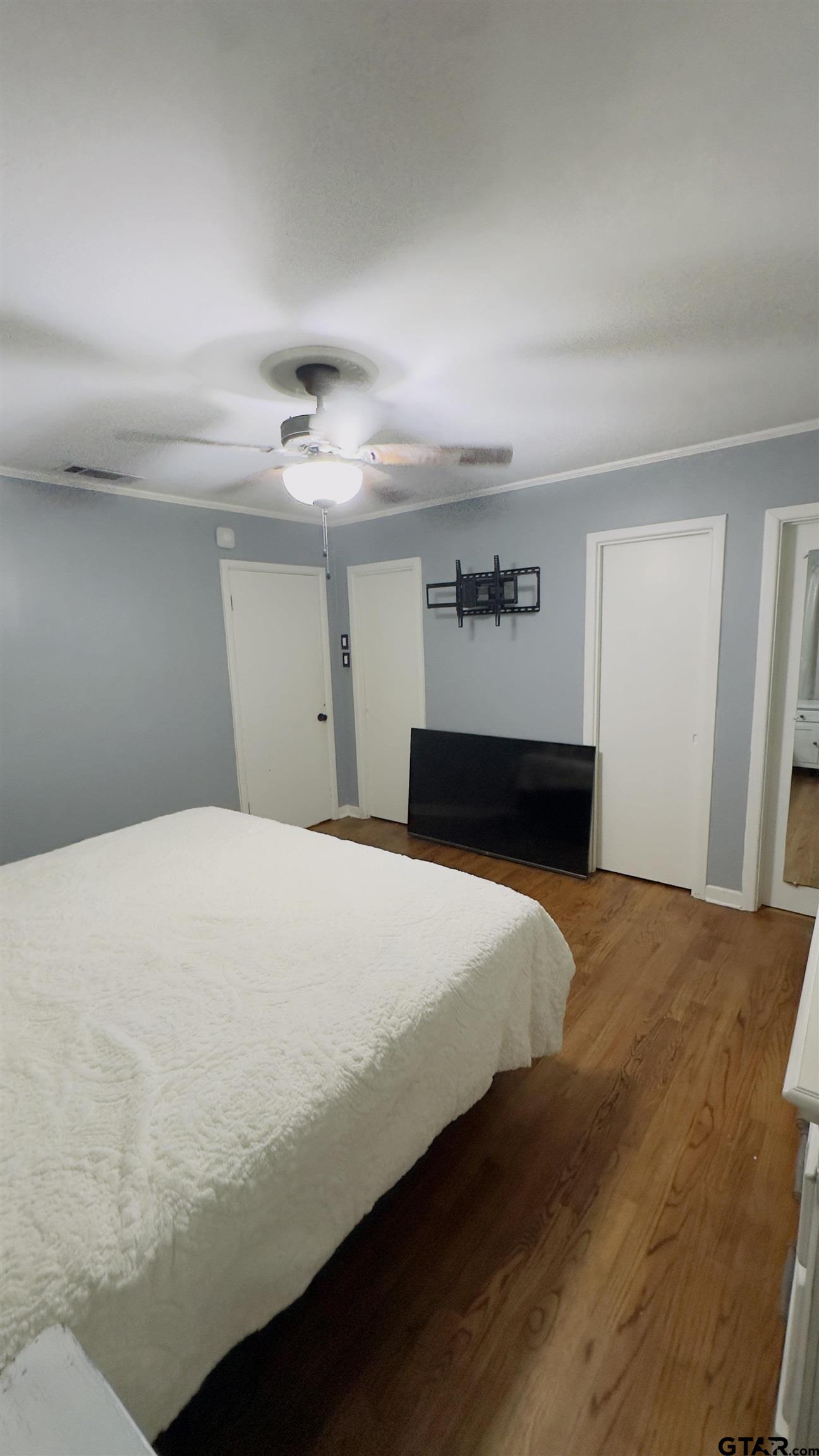 2008 Longview Drive Henderson, TX 75652 - Photo 9 of 18 a bedroom with a bed and a window