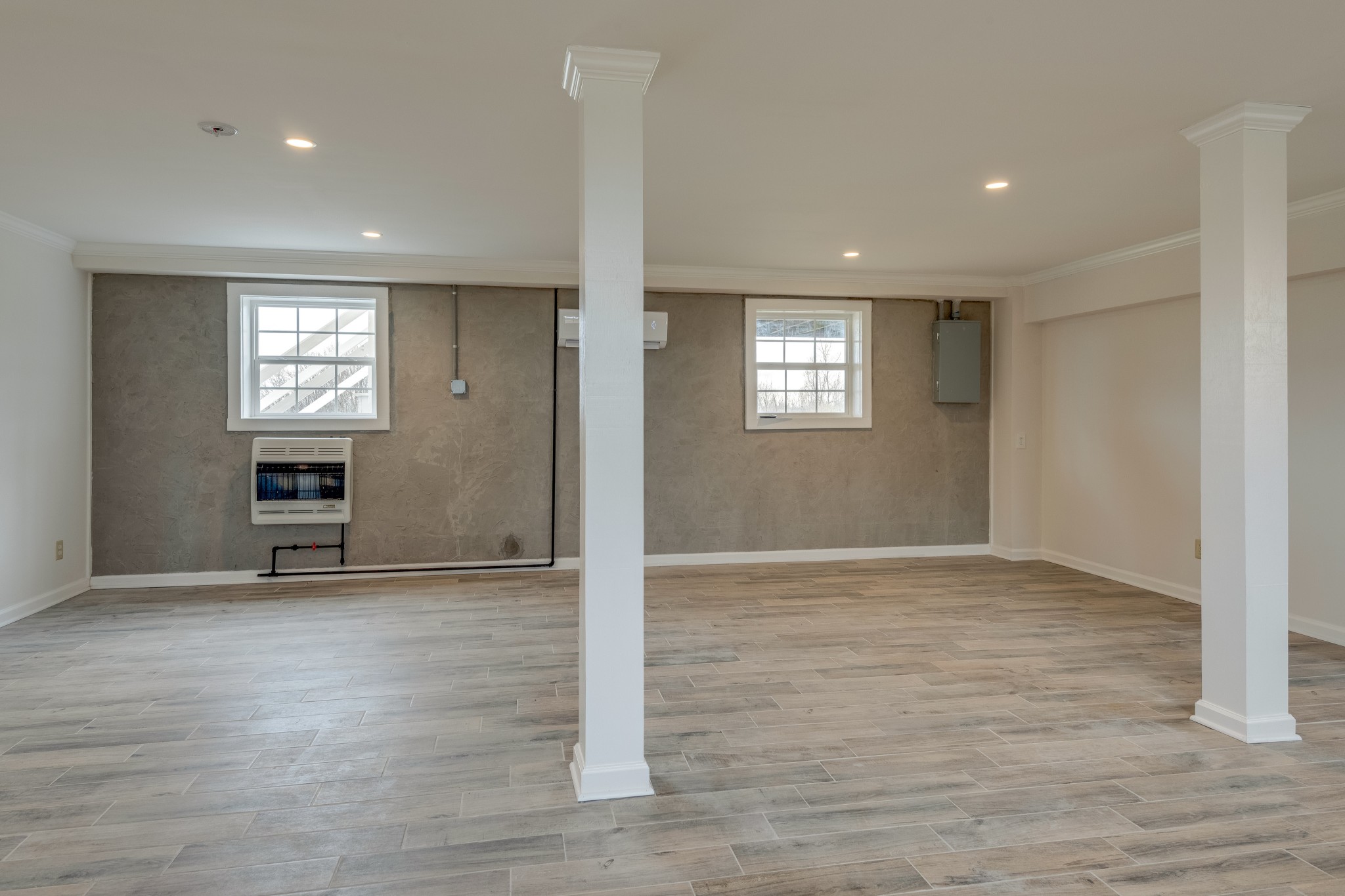 7349 Coldwater Road Fairview, TN 37062 - Photo 18 of 24 an empty room with wooden floor and windows