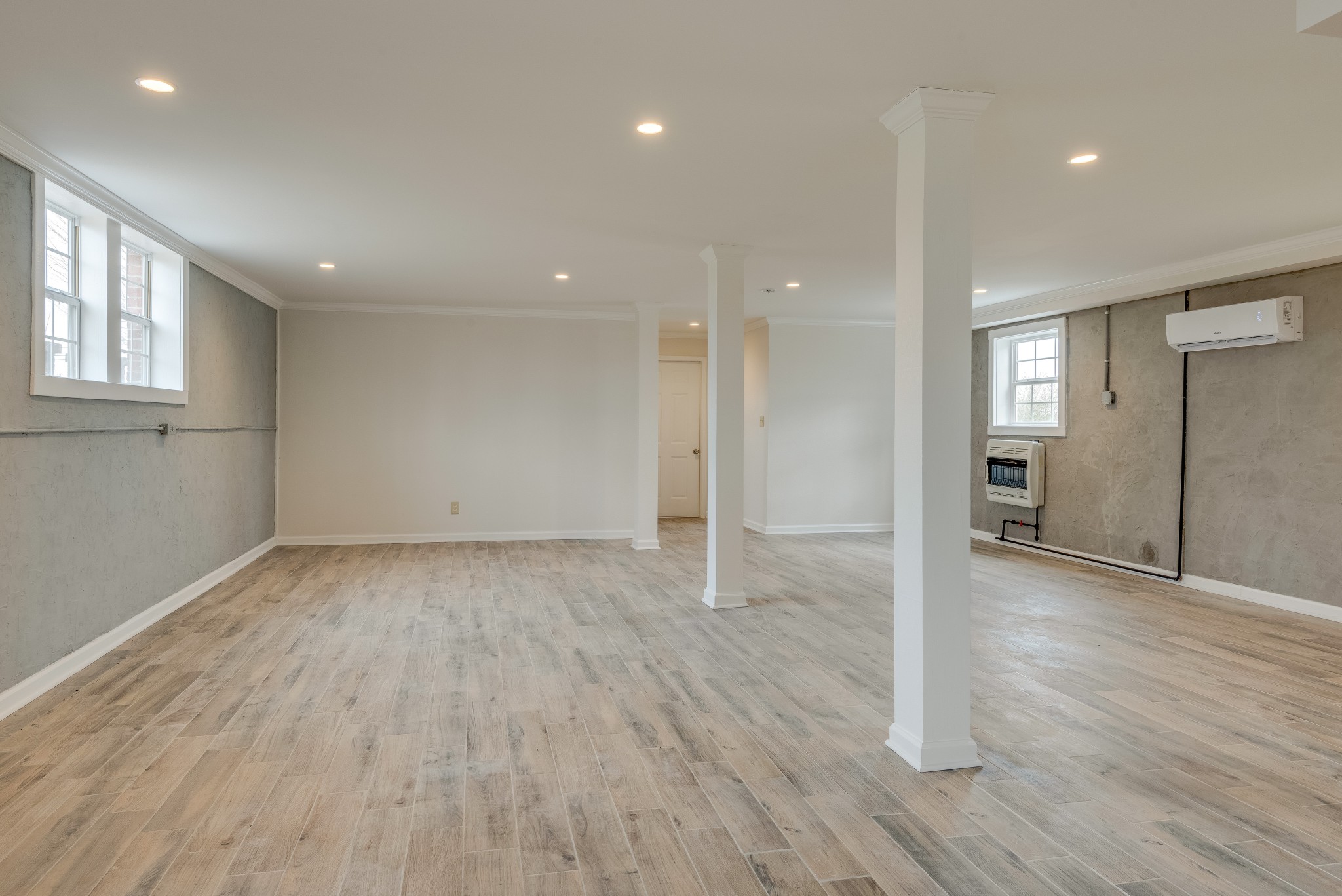 7349 Coldwater Road Fairview, TN 37062 - Photo 19 of 24 a view of a big room with wooden floor and windows