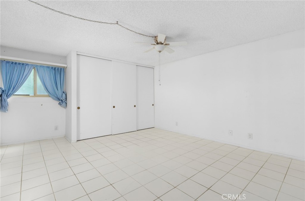 29368 Murrieta Road Menifee, CA 92586 - Photo 11 of 20 an empty room with a window
