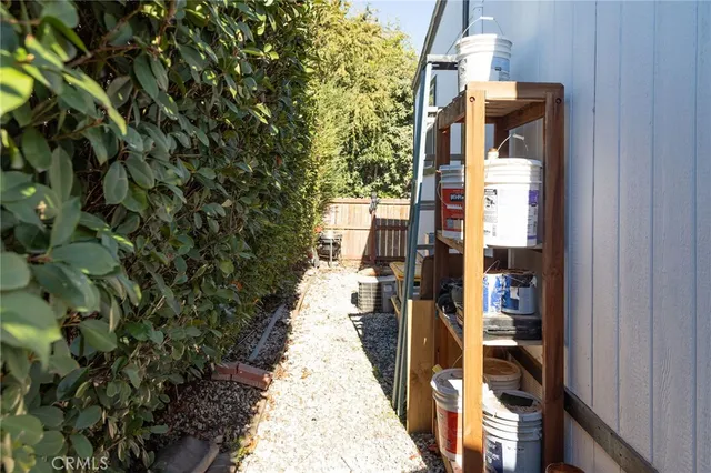 a front view of a house with swimming pool having outdoor seating