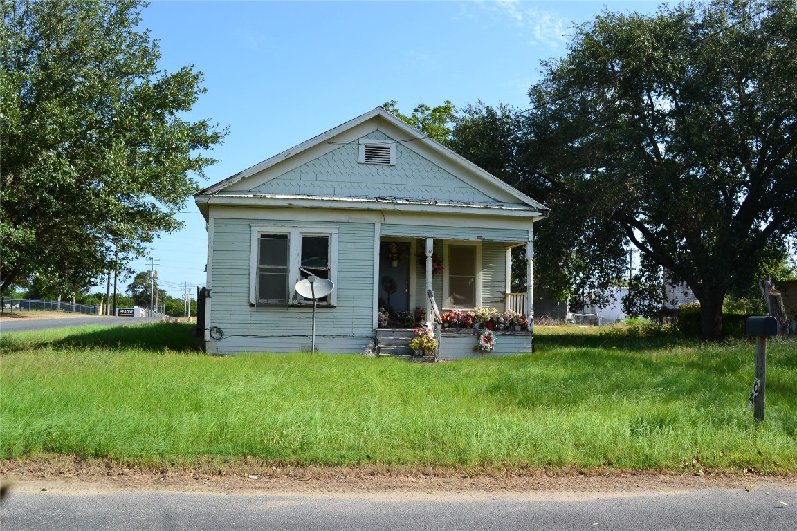 1053 Eilers Street Schulenburg, TX 78956 - Photo 1 of 5 a view of a house with a yard and sitting area