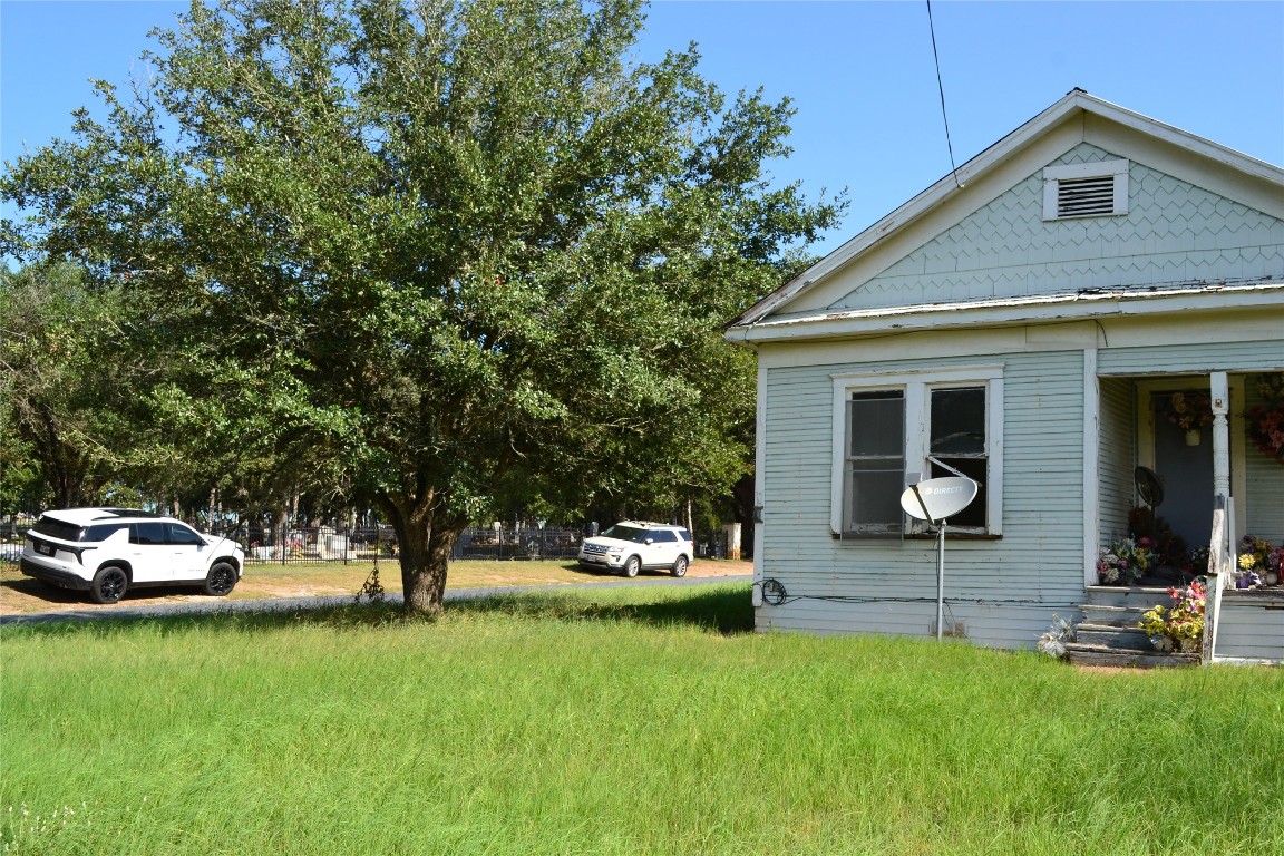 1053 Eilers Street Schulenburg, TX 78956 - Photo 5 of 5 a front view of a house with a garden