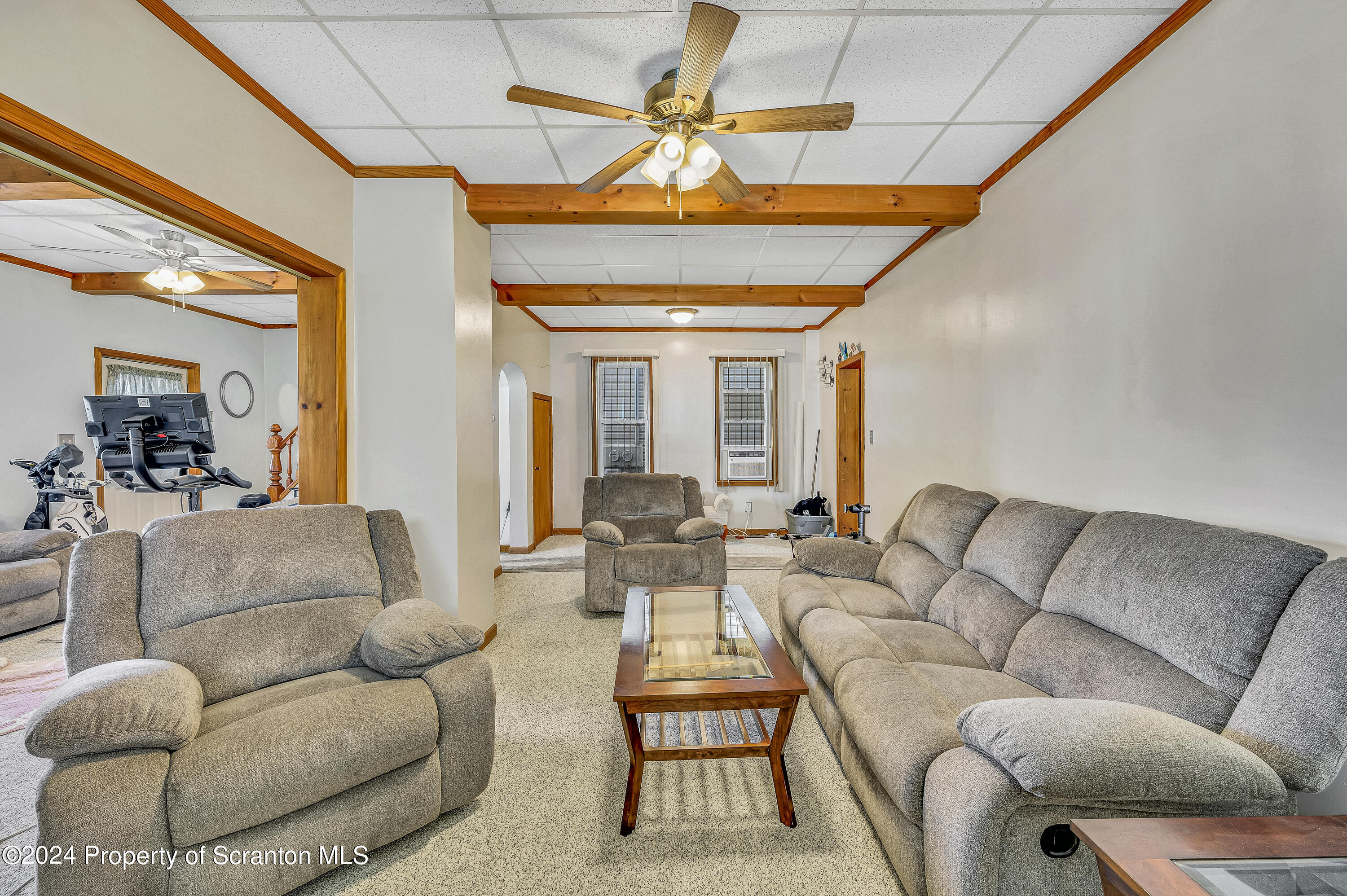 112 East Taylor Street Taylor, PA 18517 - Photo 16 of 45 a living room with furniture and a chandelier