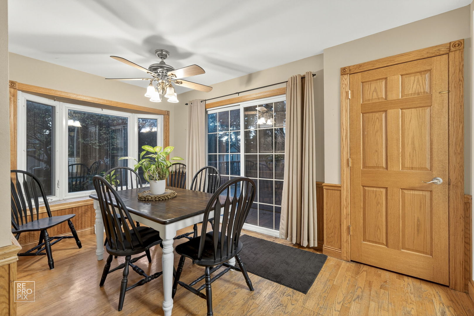 828 Carlisle Road Batavia, IL 60510 - Photo 8 of 14 a view of a dining room with furniture window and wooden floor